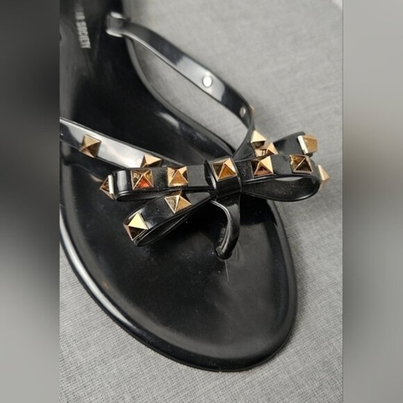 Streetwear Society Black Jelly Flip Flops with Brass Studs on the Bows. - Picture 6 of 9